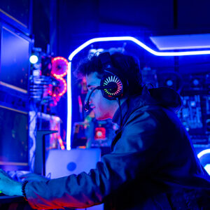 Gamer Sits At His Console Many Screens