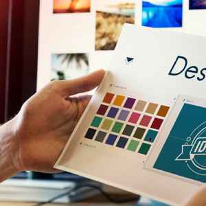 Logo Designer At His Desk