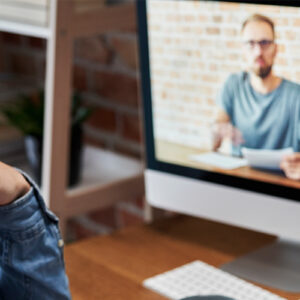 Man Learning From An Online Tutor