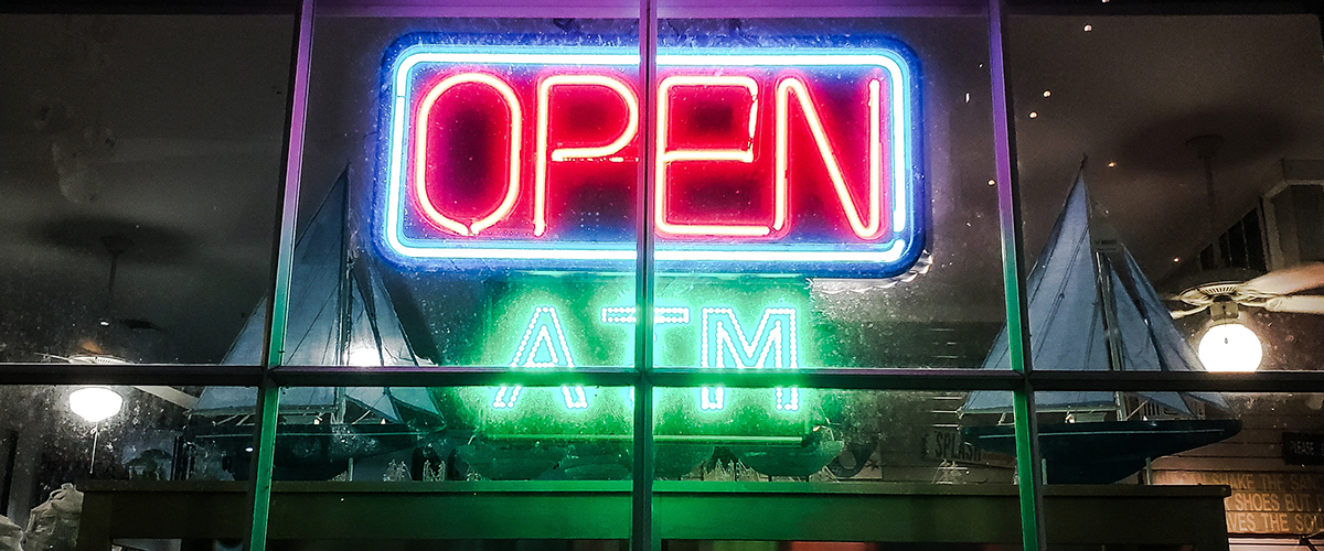 Open Sign In A Retail Store Window