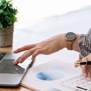 Laptop Computer And Calculator On A Desk
