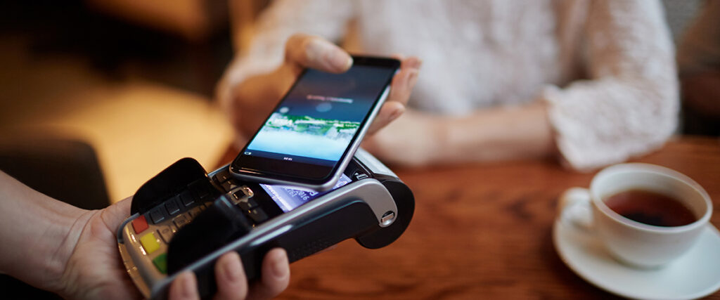 Paying By Phone In A Cafe