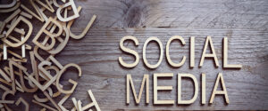 Social Media Sign On A Table