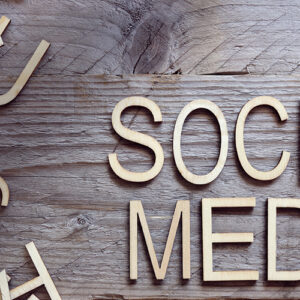 Social Media Sign On A Table
