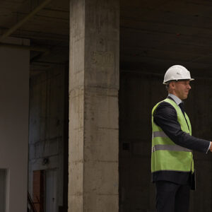Two Men Shake Hands Over A Real Estate Deal