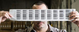Barcode Labels Held Up By A Man