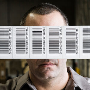 Barcode Labels Held Up By A Man